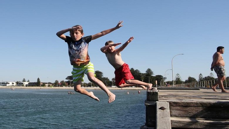Australian authorities warned people to stay indoors on Friday as a severe heatwave along the northwestern coast pushed temperatures to a blistering 50.7 degrees Celsius, hitting a high last seen 62 years ago.