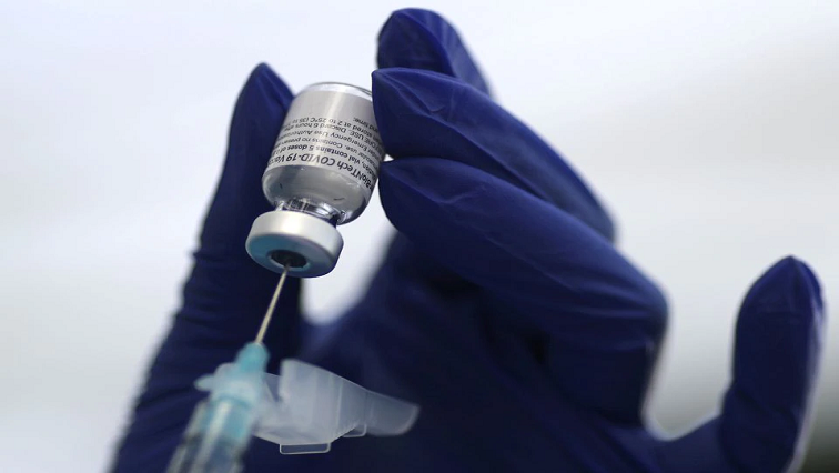 [File photo] A healthcare worker prepares a Pfizer COVID-19 vaccine.