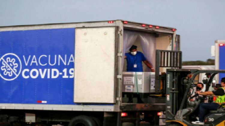 Containers of AstraZeneca vaccines under the COVAX scheme against the coronavirus disease (COVID-19) are loaded onto a truck, March 11, 2021.
