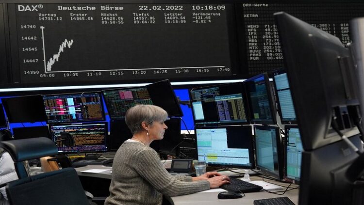 A trader works at the Frankfurt stock exchange in Frankfurt, Germany, February 22, 2022.