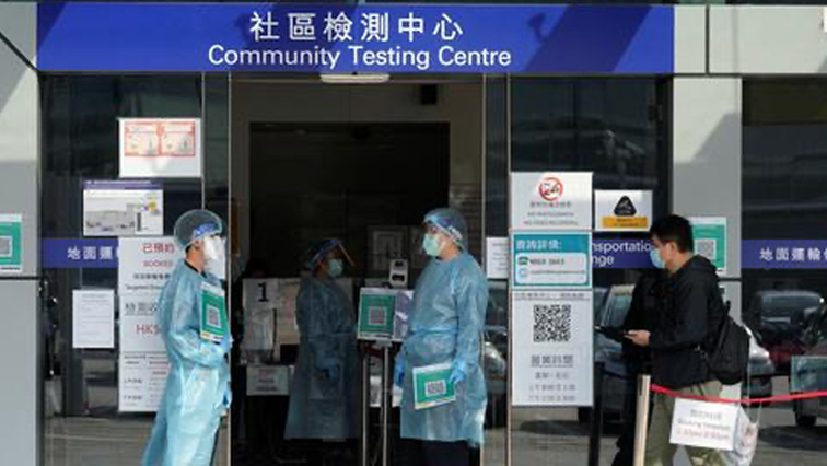 A man enters a community testing centre at Hong Kong International Airport following infections of the coronavirus disease.