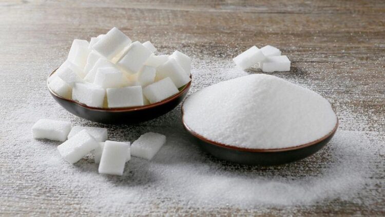 Granulated white sugar and sugar cubes are seen in this picture illustration.