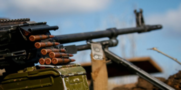 A machine gun is seen at the front line in the village of Travneve in Donetsk region, Ukraine February 21, 2022.