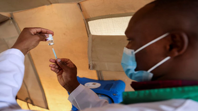 A healthcare professional prepares a dose of AstraZeneca (COVID-19) vaccine at the Narok County Referral Hospital, in Narok, Kenya, December 1, 2021.
