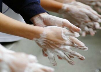 School children wash their hands during an activity for the upcoming Global Handwashing Day in Lima, October 12, 2009.