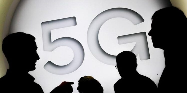 A 5G sign is seen at the Mobile World Congress in Barcelona, Spain February 28, 2018.