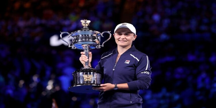 Australia's Ashleigh Barty poses as she celebrates winning the final against Danielle Collins of the US with the trophy, Australian Open Women's Singles Final at Melbourne Park, Melbourne, Australia - January 29, 2022.