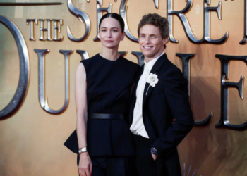 Actors Katherine Waterston and Eddie Redmayne arrive for the world premiere of the film 'Fantastic Beasts: The Secrets of Dumbledore' in London, Britain, March 29, 2022.