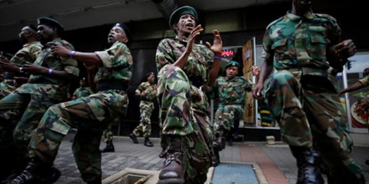 Supposed veterans of the ANC’s military wing perform the toyi-toyi protest dance outside the party’s headquarters in Johannesburg.