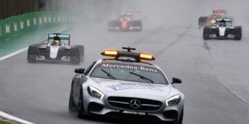 A safety car is driven on the track.