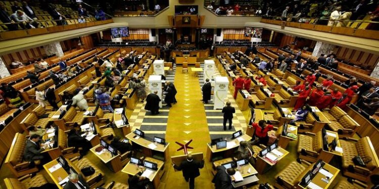 In this file image from August 8, 2017, voting stations are set up during the motion of no confidence against former president Jacob Zuma in Parliament, Cape Town.