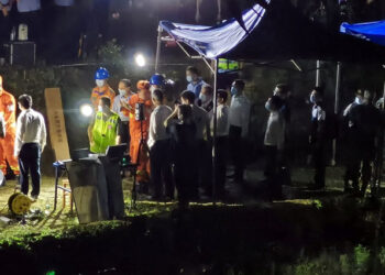 Rescue members work at the site where a China Eastern Airlines Boeing 737-800 plane flying from Kunming to Guangzhou crashed, in Wuzhou, Guangxi Zhuang Autonomous Region, China March 21, 2022.