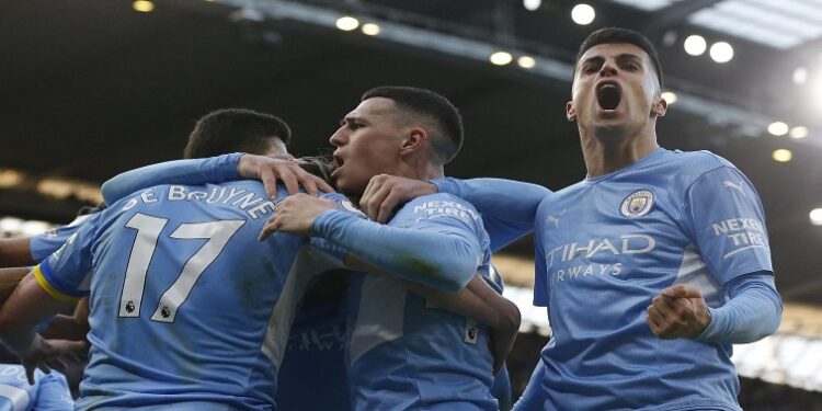 File Photo: Manchester City's Kevin De Bruyne celebrates scoring their second goal with teammates.