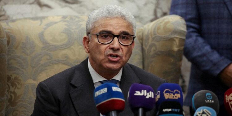 Fathi Bashagha, designated as prime minister by the parliament, delivers a speech at Mitiga International Airport, in Tripoli, Libya February 10, 2022.