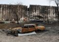 [File Image] A charred car is seen in front of an apartment building destroyed during Ukraine-Russia conflict in the besieged southern port city of Mariupol, Ukraine March 30, 2022.