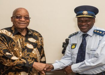 [File Image] Former President Jacob Zuma shakes hands with the National Police Commissioner General Khehla John Sitole.