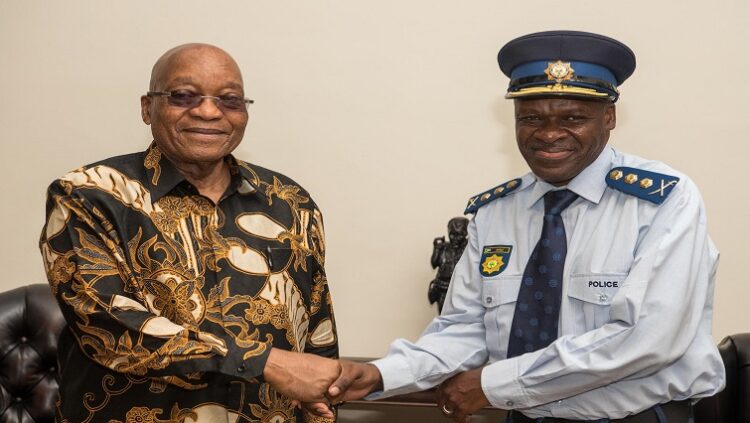 [File Image] Former President Jacob Zuma shakes hands with the National Police Commissioner General Khehla John Sitole.