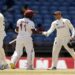 West Indies' Kraigg Brathwaite and England's Joe Root shake hands after the match.