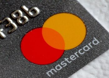 A Mastercard logo is seen on a credit card in this picture illustration August 30, 2017.