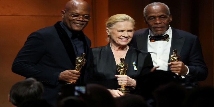 Actors Samuel L. Jackson, Liv Ullmann and Danny Clover pose after accepting their honorary Oscars during the 12th Governors Awards at The Ray Dolby Ballroom in Los Angeles, California, U.S. March 25, 2022.