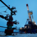 A well head and drilling rig in the Yarakta oilfield, owned by Irkutsk Oil Company (INK), in the Irkutsk region, Russia, March 11, 2019.