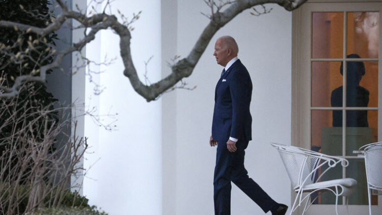 US President Joe Biden departs the Oval Office at the White House for the weekend, in Washington, DC, US, March 4, 2022.