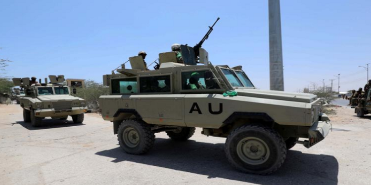 FILE PHOTO: Burundian African Union peacekeepers in Somalia travel in armoured vehicle as they leave the Jaale Siad Military academy after being replaced by the Somali military in Mogadishu, Somalia. February 28, 2019.