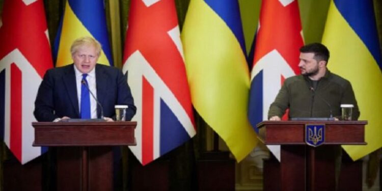 Ukraine's President Volodymyr Zelenskiy and British Prime Minister Boris Johnson attend a news briefing, as Russia's attack on Ukraine continues, in Kyiv, Ukraine April 9, 2022.