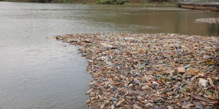 Plastic waste floats near the entrance to the Ruzizi I hydroelectric plant in Bukavu, eastern Democratic Republic of Congo October 20, 2021.