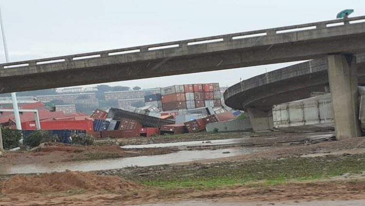 A view of collapsed containers destroyed by the heavy rains and flooding, across from the old airport south of Durban, April 13, 2022.
