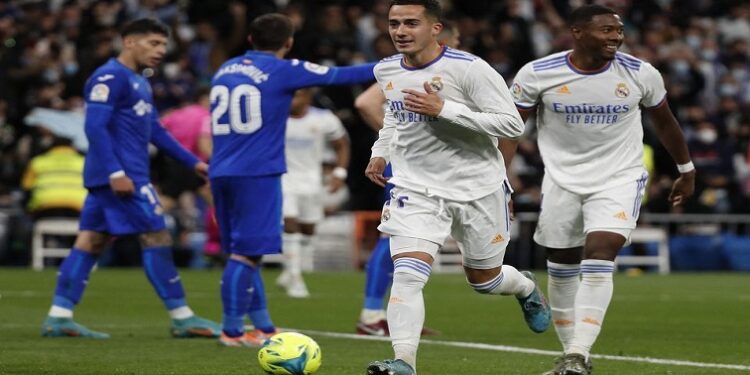 Real Madrid's Lucas Vazquez celebrates scoring their second goal with David Alaba.