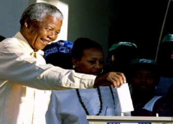 Former president Nelson Mandela votes in the 1994 elections.