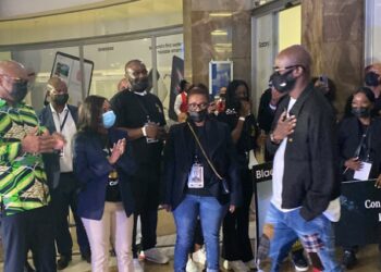 Minister Nathi Mthethwa welcomes Black Coffee at the OR Tambo International Airport, April 6, 2022.