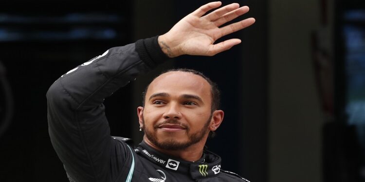 Lewis Hamilton celebrates after qualifying in pole position [File image]