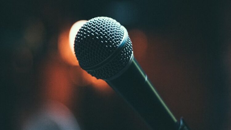 A microphone on stage before a concert