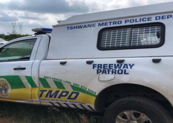 Tshwane Metro Police Department (TMPD) van is seen parked next to the highway during a roadblock.