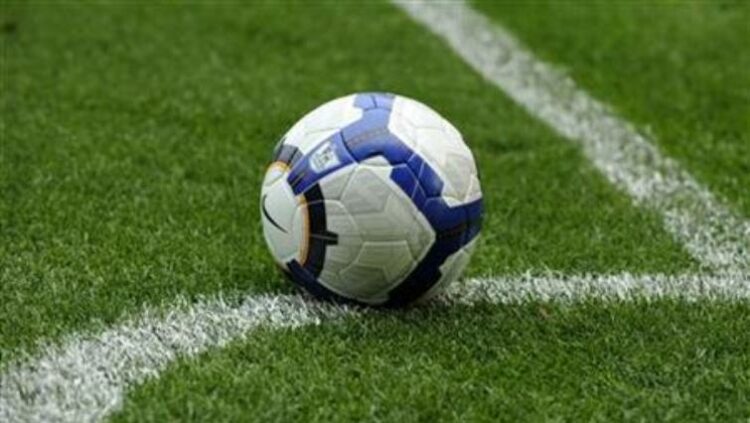 A soccer ball seen on a field.