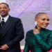 Will Smith and Jada Pinkett Smith pose on the red carpet during the Oscars arrivals
