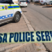 File Image: SAPS vehicles and a police tape.