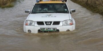 A SASSA vehicle is seen submerged in water amid flooding in Deelpan, North West, on 21 April 2022.