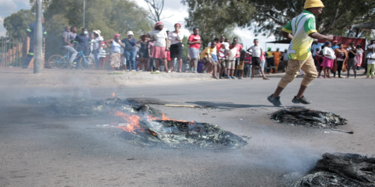 Diepsloot resident protesting against the spate of crimes in the area.