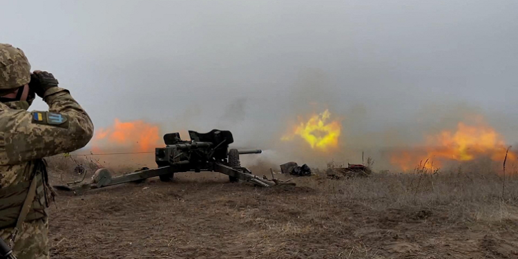 Service members of the 92nd Separate Mechanized Brigade of the Ukrainian Armed Forces hold artillery drills at a shooting range in an unknown location in eastern Ukraine, in this handout picture released December 17, 2021.