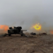 Service members of the 92nd Separate Mechanized Brigade of the Ukrainian Armed Forces hold artillery drills at a shooting range in an unknown location in eastern Ukraine, in this handout picture released December 17, 2021.