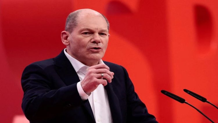 German Chancellor Olaf Scholz speaks during a hybrid party congress of Germany's Social Democratic Party (SPD) in Berlin, Germany, December 11, 2021.