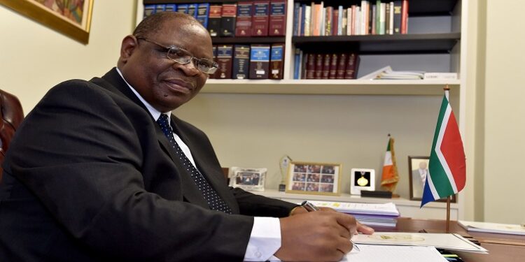 Chief Justice Raymond Zondo seen in his office