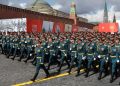 Russian service members march during a parade on Victory Day.