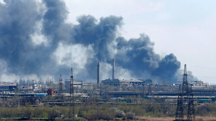 Smoke rises above a plant of Azovstal Iron and Steel Works company during Ukraine-Russia conflict in the southern port city of Mariupol, Ukraine April 20, 2022.