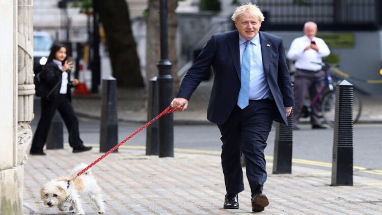 British Prime Minister Boris Johnson with his dog Dilyn [File image]