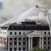 Firefighters at Parliament as the fire flared up again, in Cape Town, South Africa, January 3, 2022.