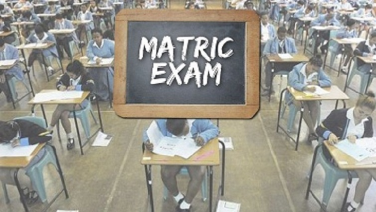 (File Image) Learners seen writing exams.